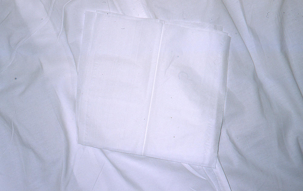 paper napkin on bed